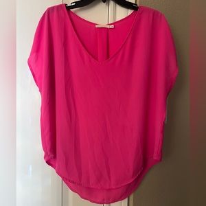 Hot pink short sleeve blouse. Size L. Brand: Lush.